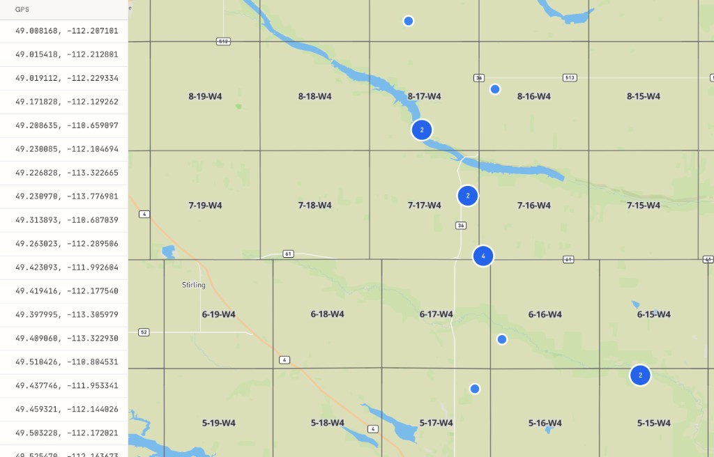 Batch converter results for southern Alberta irrigation quarter sections near Township 10, Range 19, W4M, with GPS coordinates and satellite imagery showing pivot circles